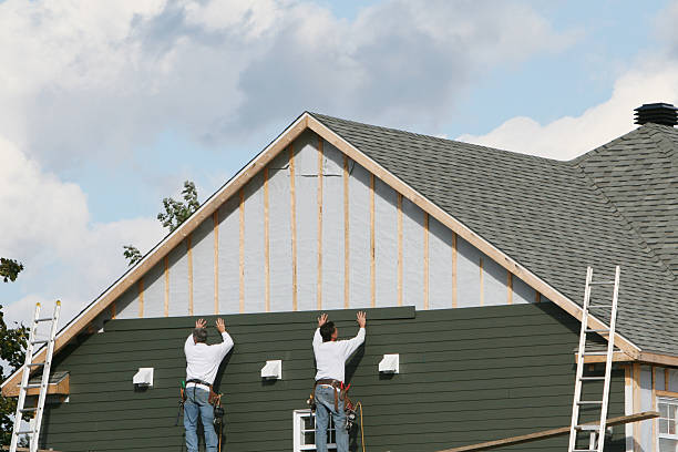 Professional Storm Damage Siding Repair technician working in Sheffield Lake, OH